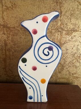 1990s ceramic art vase with swirl and dot pattern and blue sides